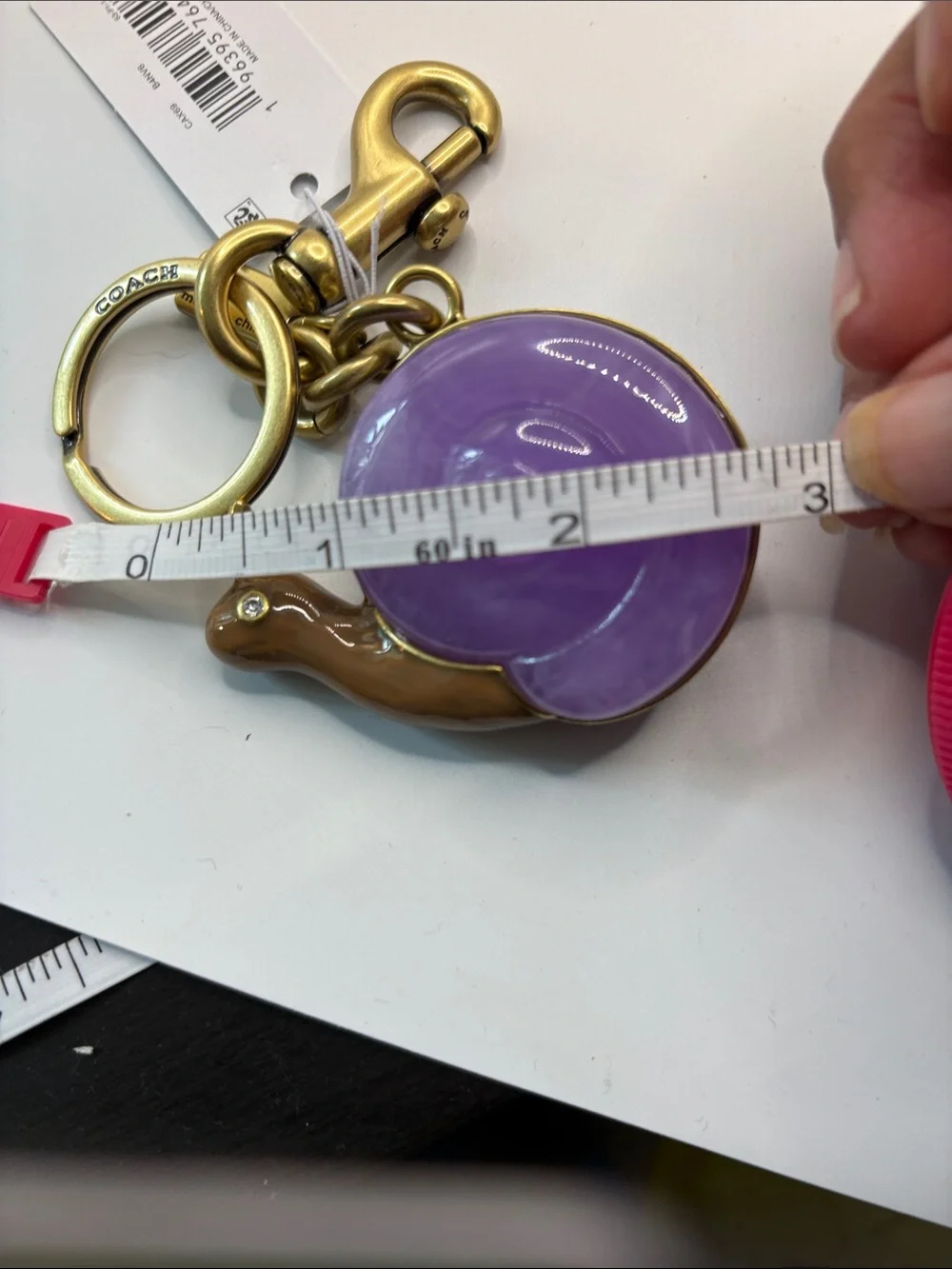 Coach key charm